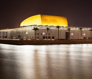Manama, Bahrain - November 17, 2015: The Bahrain National Museum in Manama illuminated at night