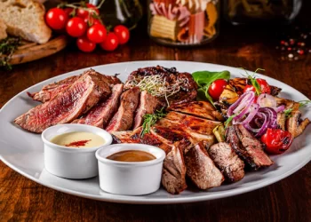 turkish-cuisine-assorted-different-meat-grill-lamb-chicken-pork-with-grilled-vegetables-serving-dishes-restaurant-white-plate_127425-521